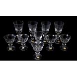 A set of five Hadeland cut glass wine goblets, the bucket shaped bowls with air bubble inclusions,