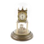 A Continental 400 Day anniversary clock, circular enamel dial bearing Arabic numerals,