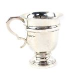 A George V silver christening tankard, of baluster form, Walker & Hall, Sheffield 1910, 2.88oz.