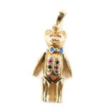 An articulated Teddy Bear pendant, gem set in yellow metal, hall marked for London, 14.6g.