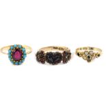 A 9ct gold seed pearl and emerald ring, in a floral design, size I, turquoise and almandine garnet