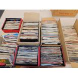 Record singles rock pop easy listening, etc, contained in three cases and four boxes.