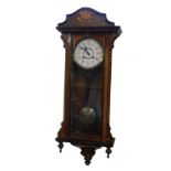 A late 19thC Continental walnut and inlaid Vienna wall clock, circular brass and metal dial