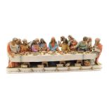 A Capo di Monte porcelain figure modelled as The Last Supper, After Leonard di Vinci, by Giacomo