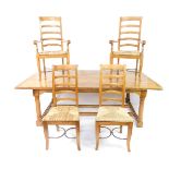 A mango wood and marble inlaid refectory dining table, the parquetry top raised on turned column