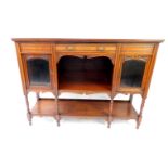A Victorian mahogany sideboard, lacking mirror back, with a central frieze drawer above a recess