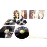 A Beatles White Album first press, No 0349364, and a later White Album. (2)