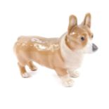 A Royal Copenhagen porcelain figure of a Corgi dog, modelled standing, No 4593, printed and