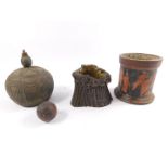 A 19thC coconut carved with a sailing vessel and a bird on a branch, a Victorian terracotta jar with