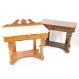 A Victorian satin walnut and marble topped washstand, with a carved back, single frieze drawer,