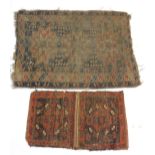 A 19thC Bokhara double bag face, and a Caucasian rug of geometrical design, 133cm x 100cm. (both