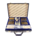 A Bestecke SBS Solingen canteen of cutlery, seventy pieces, in 23/24ct gold plate, blue leather