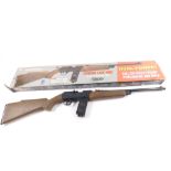 A Daisy Powerline 990 dual power air rifle, CO2 or multi pump, shoots pellets or BBs, boxed.