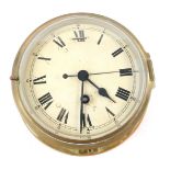 A 20thC brass circular cased ship's clock, enamel dial bearing Roman numerals, back plate etched for