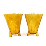 A pair of Art Deco amber glass vases, of triangular form, with moulded fan decoration and frosted
