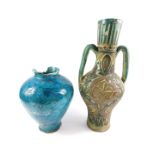 An Iznik pottery twin handled vase, probably 19thC, of twin handled bulbous form decorated with