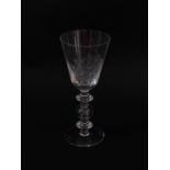 Brian Jabez Francis R.M.S, S.G.A. A glass goblet, the tapering bowl etched with the Coat of Arms