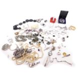 Silver and costume jewellery, including rings, brooches, earrings, dress wristwatches and beads. (