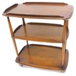 An Ercol mid elm three tiered galleried trolley, on castors, 69cm W.