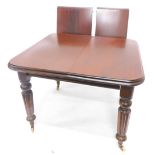 A Victorian and mahogany extending dining table, the rectangular top with a moulded edge, one