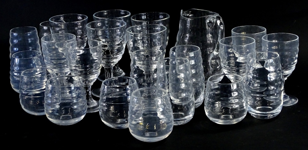 A suite of modern table glass, to include a water jug, tumblers, other glasses, large and small wine