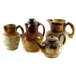 Four items of stoneware, to include a flagon, decorated with figures, windmill, hunting scene, etc.,