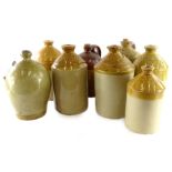 A collection of eight Lincolnshire related stoneware jars, to include Robinson of Market Rasen,