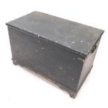 A Victorian painted blanket box, the hinged lid enclosing a candle compartment, on bracket feet,