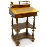 A Victorian walnut Davenport/whatnot, the top with a hinged galleried compartment for inkwells and