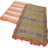 A flat weave rug, decorated with geometric designs and a rag rug. (2)