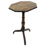 A 19thC mahogany occasional table, the octagonal top on a turned column and reeded tripod base,