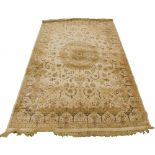 A modern Belgian cotton Persian style carpet, with a design of flowers, scrolls, surrounding a