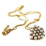 A Victorian 9ct gold pendant and chain, the heart shaped pendant set with various seed pearls, in