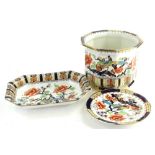 A Losol ware Shanghai pattern jardiniere, a canted rectangular dish and a plate. (3)