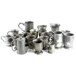 Various 19thC pewter tankards, mainly with a shaped foot, etc.