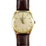 An International Watch Company (IWC) Schaffhausen 9ct gold gentleman's wristwatch, with circular