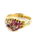 A 15ct gold cluster ring, formed of two hearts, one with garnets, the other with seed pearls, in
