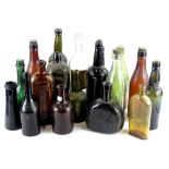 A quantity of wine bottles and other coloured bottles, to include an example stamped Keystone
