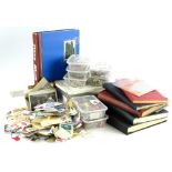 A large quantity of loose stamps, etc.