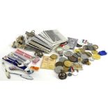 Miscellaneous items, to include Royal commemorative medallions, military cap badges, lead seals,