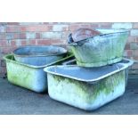 Various galvanised corner horse or animal feeding troughs, a bath, a mixing bowl, etc.