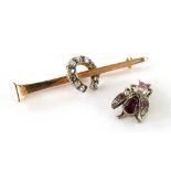 Two items of stone set jewellery, to include a horse shoe bar brooch, with diamond set horse shoe,