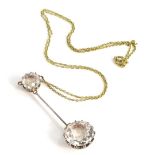 A two tier pendant drop and chain, set with two imitation diamond stones, in claw setting, on a