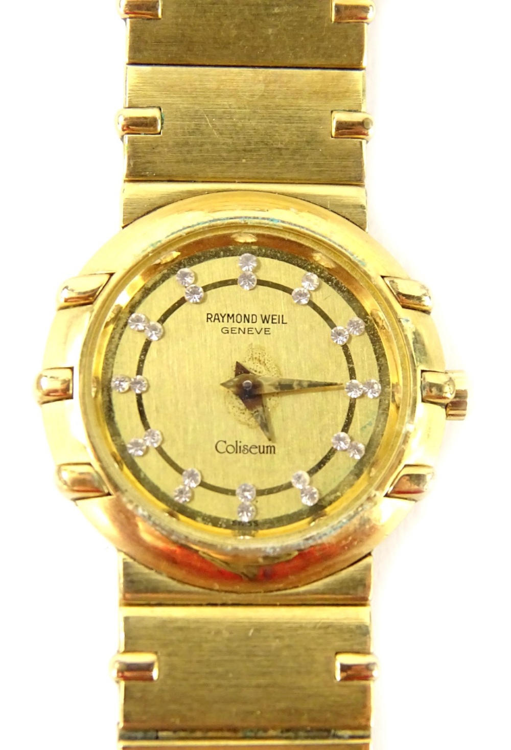 A Raymond Weil ladies wristwatch, with circular watch head set with white stones, marked to rear 18K