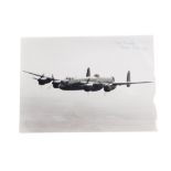 A photograph of a Lancaster signed by Dambuster Len Sumpter.