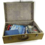 A vintage canvas trunk and a quantity of war books, Battle of Britain souvenirs, Air Pictorial,