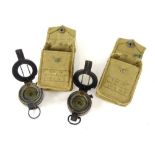Two Second World War T.G Company Limited Mark III military compasses, dated 1940 and 1942, each with