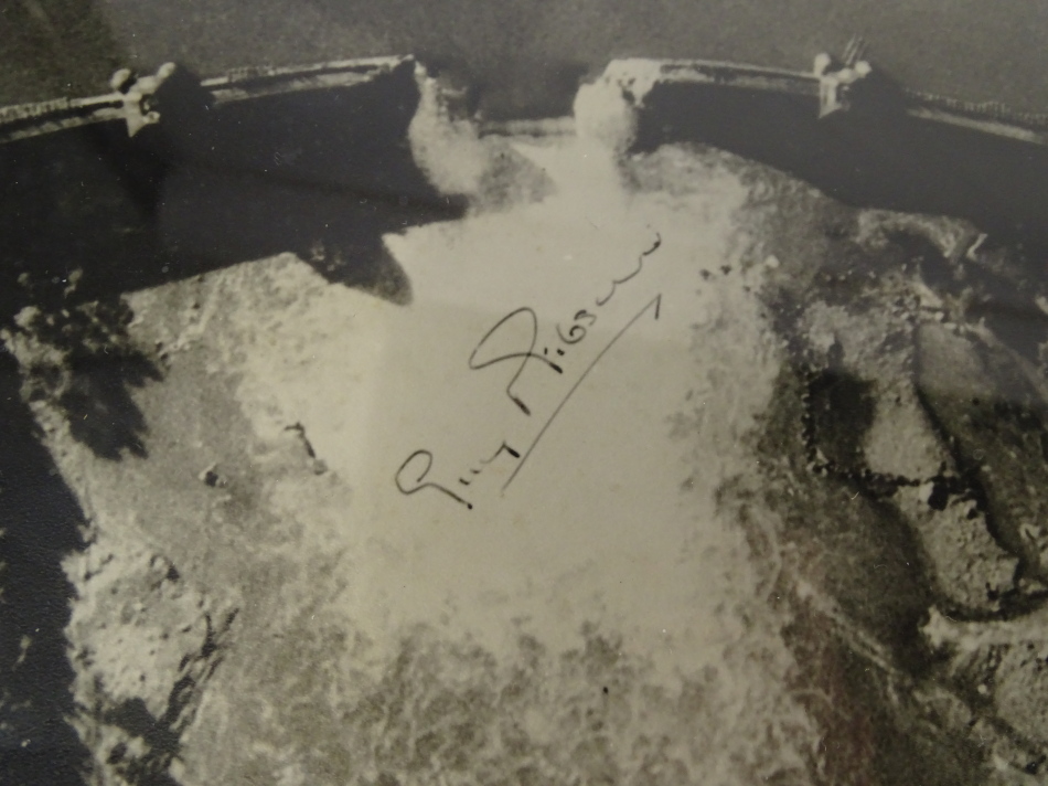 A photograph of Guy Gibson about to sign a chart for The Mohne Dam Raid, with many signatures - Image 4 of 6