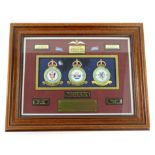 A limited edition Guy Gibson memorial plaque, with crests, mottos and badges, No. 2 of 50, signed