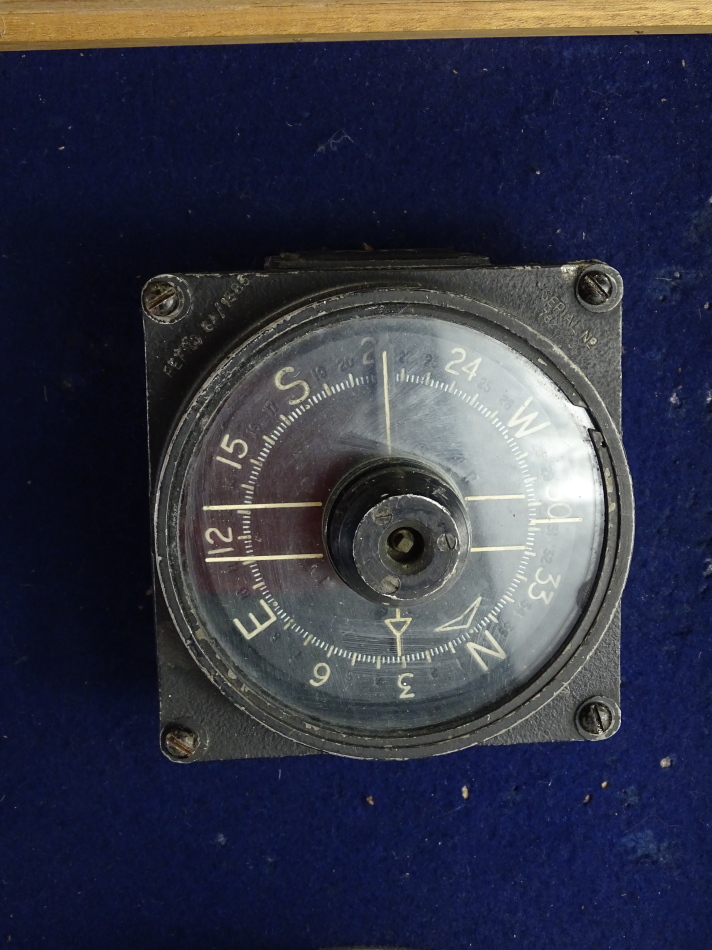 A display board of four panel instruments, marked 'from Wing Commander Guy Gibson's Lancaster Bomber - Image 3 of 7